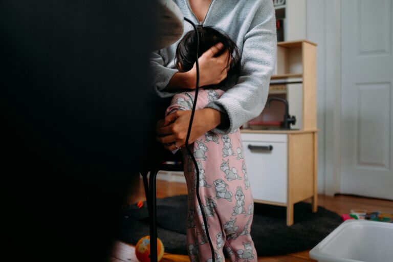 Woman hugging her daughter